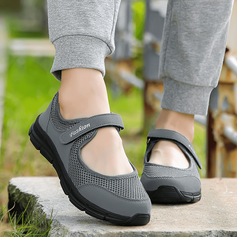 Women's breathable vulcanized mesh sneakers, grey, with hook and loop closure, providing lightweight comfort and style.